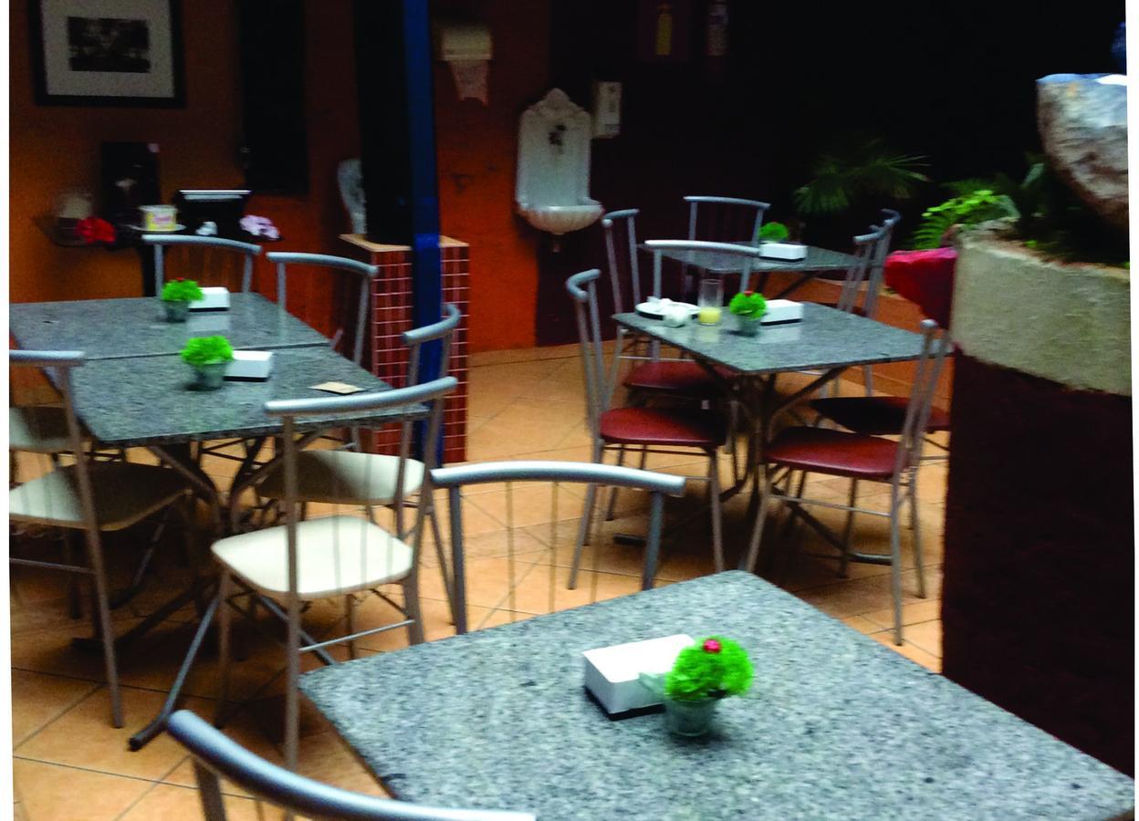 Hotel Itabira Bagian luar foto